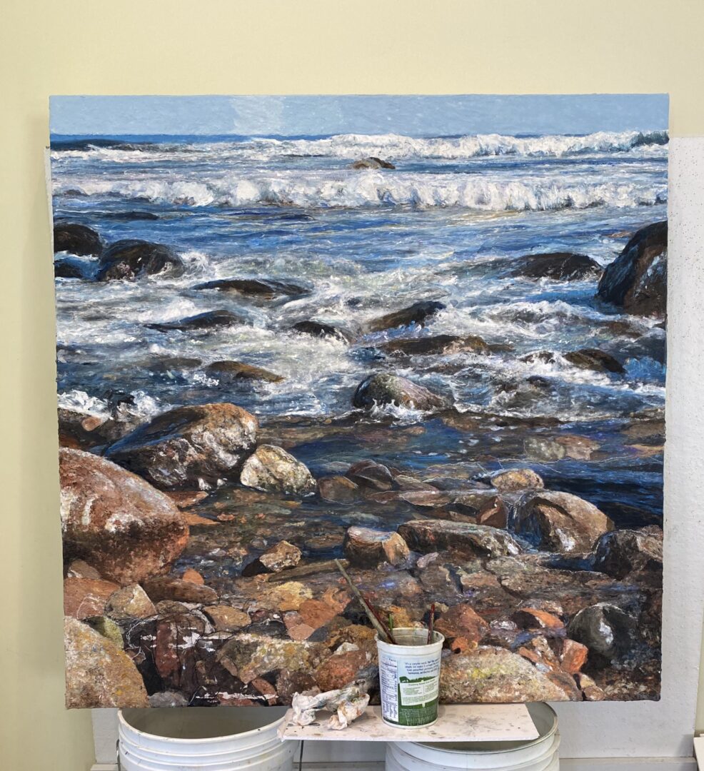 159. Applying over-beaten abaca to the surface of the painting.
